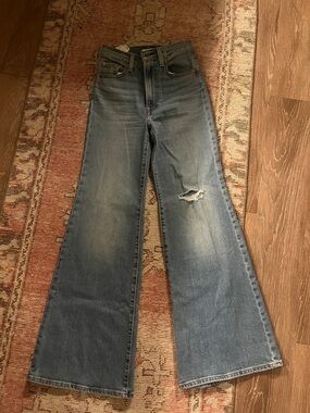 Levi's Light Blue High-Rise Flare Jeans with Knee Rip